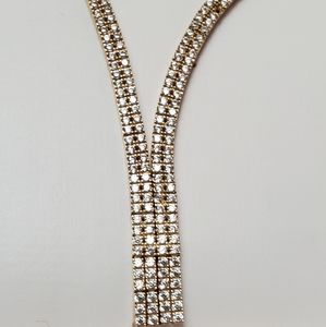 V necklace. FAVORI.  14kt with diamonds.